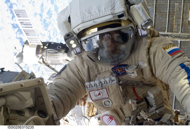 Cosmonaut Oleg Skripochka in an Orlan-MK spacesuit while performing an EVA