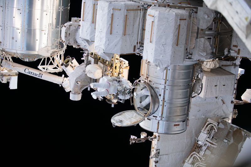 Astronauts Stephen Bowen and Sultan Alneyadi exit the Quest Airlock